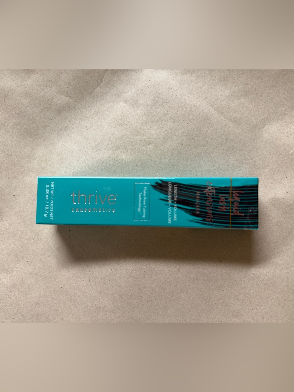 Thrive Causemetics Mascara in Teal Packaging with Black Accent
